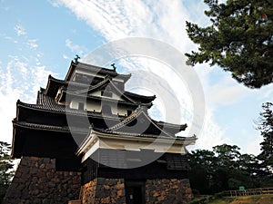 The Tenshu (keep tower) of the Matsue Castle (æ¾æ±ŸåŸŽå¤©å®ˆ) under sunset in Matsue City, Shimane, JAPAN